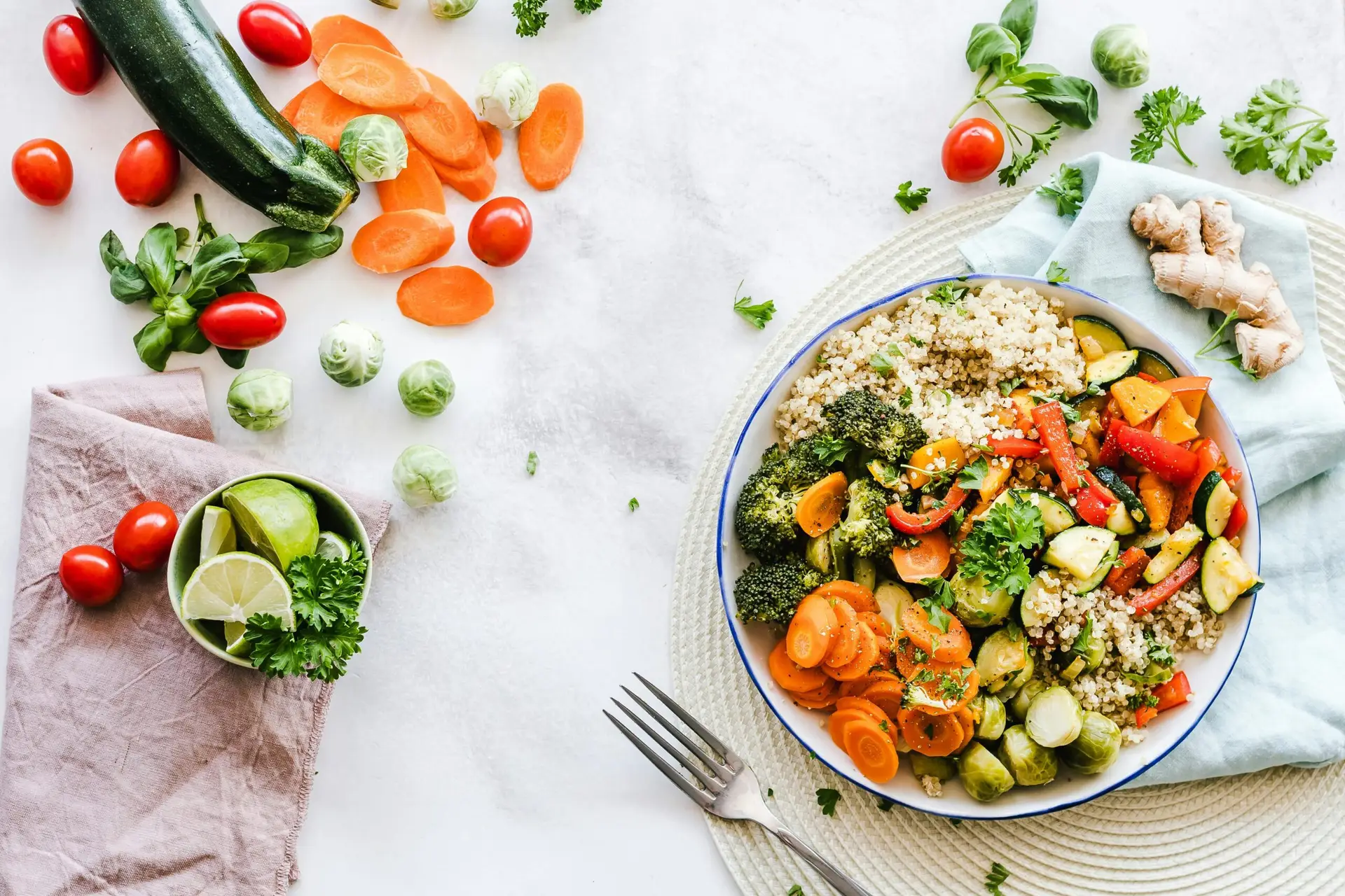 delicious looking balanced meal with plate of vegetables, fruits, carbohydrates and proteins