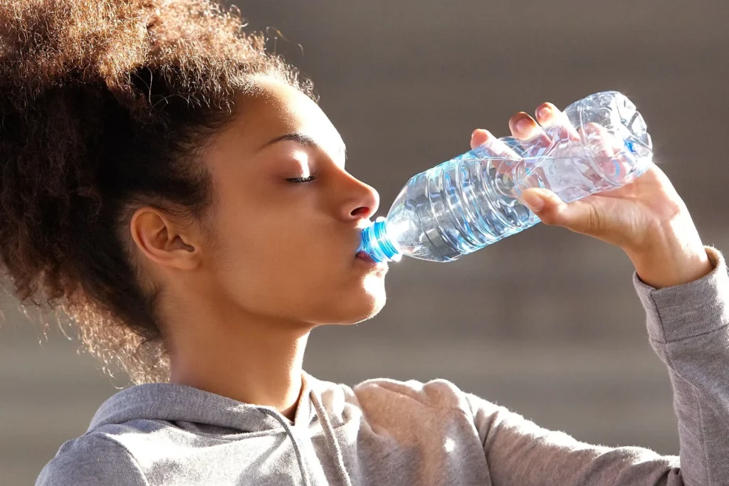 1800ss thinkstock rf woman drinking water